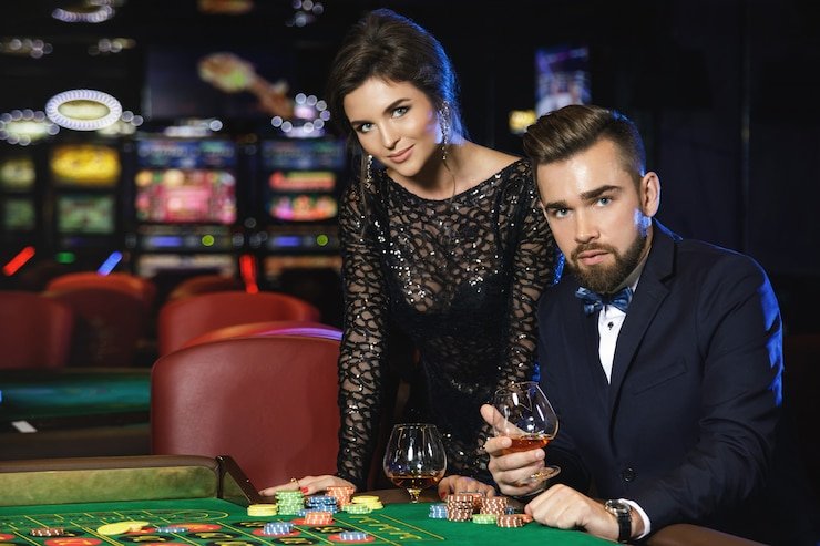 Multi-camera Pretty Gaming live studio on wede388 login showing blackjack table with dealer and card close-up